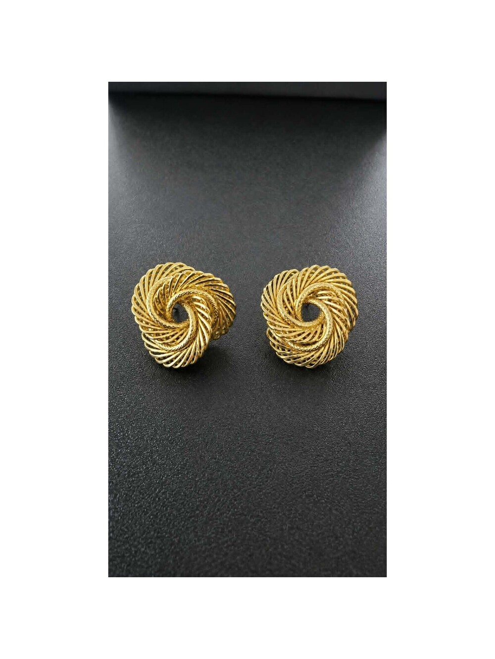 Vintage gold tone woven swirl knot post earrings